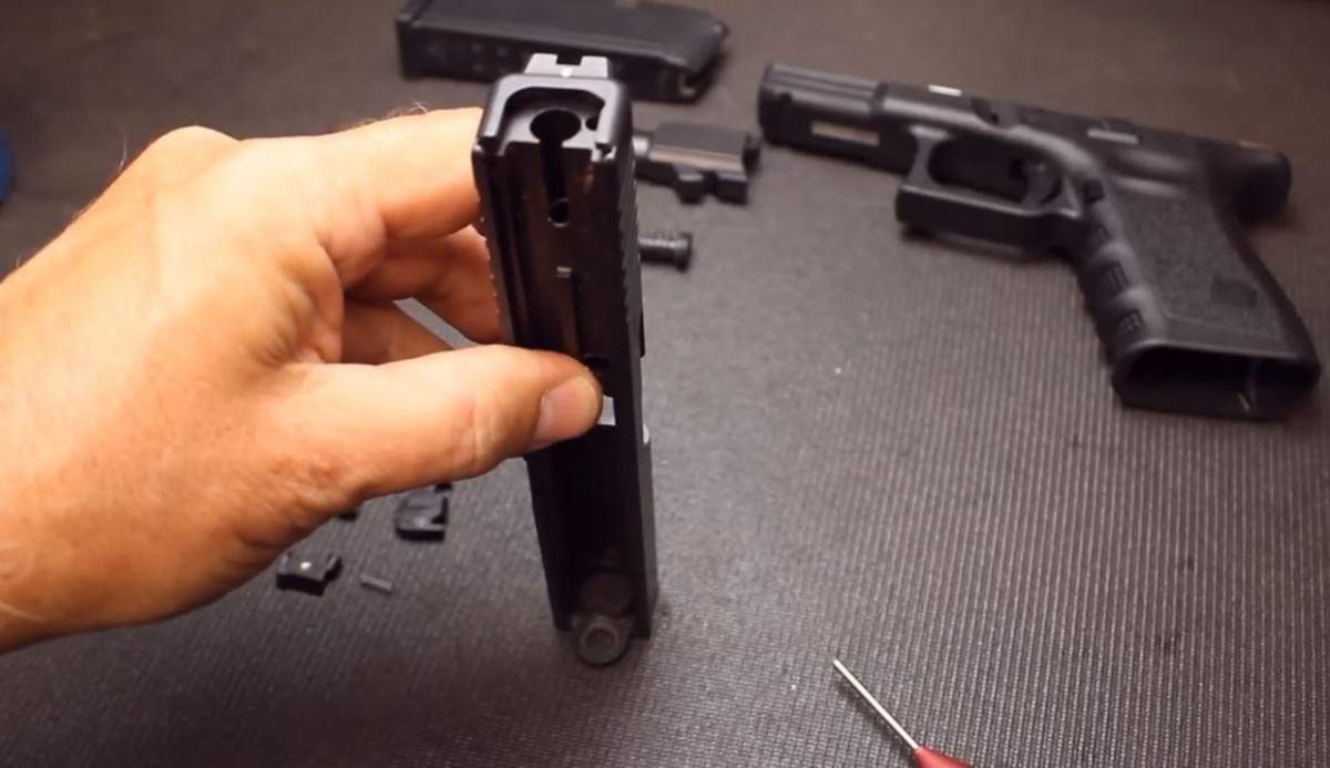 how to disassemble a pistol